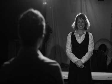 Isabella Jarrett as John in 'Desk Job'